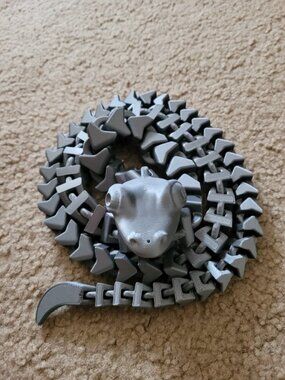 Flexible Snake with Hole For String (Cat Toy) is a beautifully designed 3D print